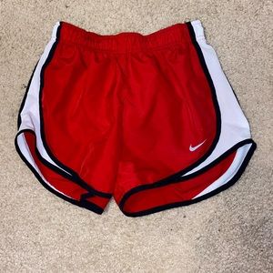red nike shorts